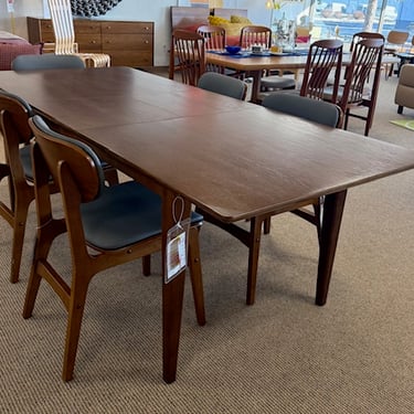 Butterfly Leaf Dining Table and 6 Chairs<br />Medium Brown Wood<br />Gray Poly Upholstery<br />Table<br />L 64-82 x W 36 x H 29.5<br />Chairs<br />L 18 x D 20 x H 31.5<br />Sold as a set of 7