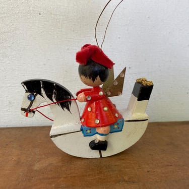 Vintage Italian Erzgebirge Style Angel On Rocking Horse Wooden Christmas Ornament, Girl Angel Red Dress And Rhinestones 