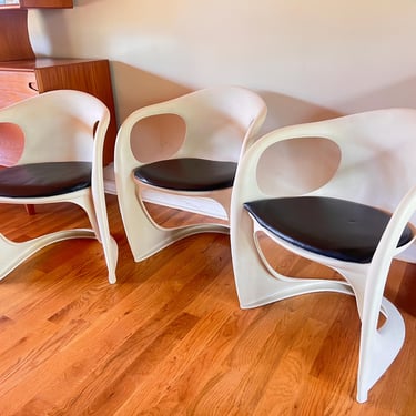 Set of 3 Vintage Casalino Chairs by Alexander Begge for Casala - 1970s Space Age White Stacking Chairs with Black Vinyl Cushions 