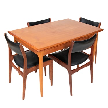 Slim Danish Teak Exp Dining Table w. a Gentle Taper + Beveled Edges