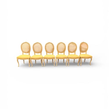 Beautiful set of six vintage French cane back dining chairs with all new upholstery 