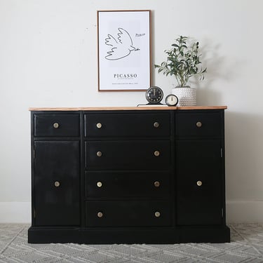 A Beautiful Black Buffet with a Wood Top