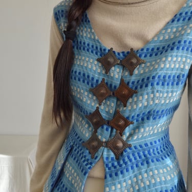 woven geometric pleated vest with brass buckles 