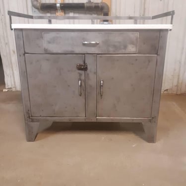 Vintage industrial stripped steel medical cabinet by the Shampaine Company in St Louis 