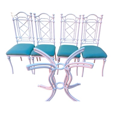 A set of four vintage Kessler faux bamboo cast aluminum chairs with all new paint and upholstery and matching table base 