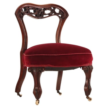 An Antique Victorian Carved Walnut Boudoir Chair, 19th Century.