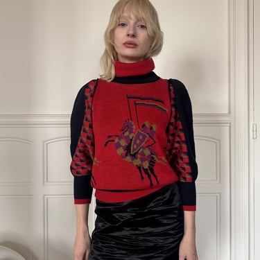 Fall Winter 1983 Chacok sweater, knights intasia on red, rolled neck, black puffy sleeves / small 