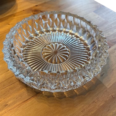 Heavyweight vintage pressed glass crystal cigar ashtray, midcentury, approximately 7.25 inches diameter 