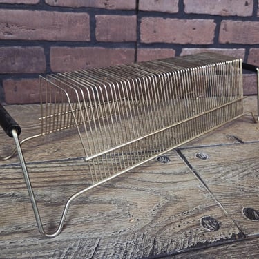 Mid Century MCM Brass Wire Record Holder with Black Handles 