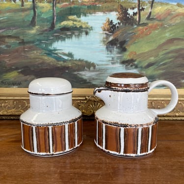 Free shipping within continental US - This vintage ceramic creamer and lidded sugar bowl set was produced by Midwinter Pottery in England. 