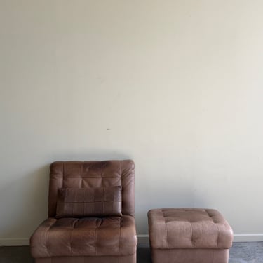 Swiss brown leather lounge chair with ottoman