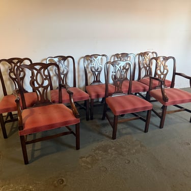 Eight chippendale style dining chairs 