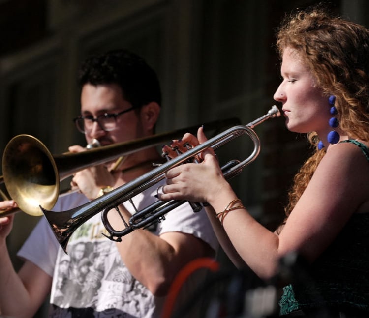 Woman playing a trumpet