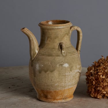 A Yue Wei Dynasty Teapot found in the Musi River Basin in Sumatra with a Pale Celadon Glaze and No Repair