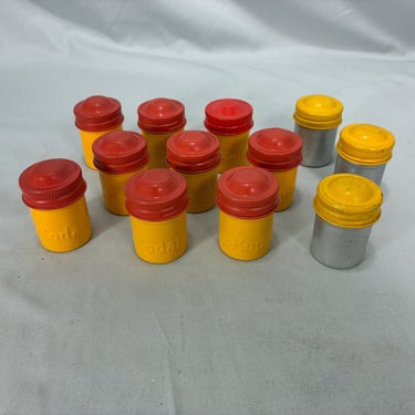 Lot of 12 vintage metal film canisters - yellow, red and silver, photographic film containers with screw on lids, small metal cans 