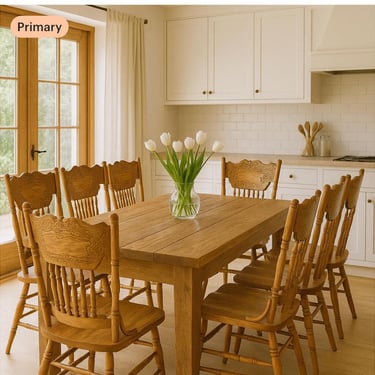 9piece set . Wood Table with 8 wood pressback chairs . 