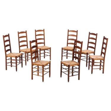 Eight French oak & rush dining chairs in manner of Charlotte Perriand, C. 1950.