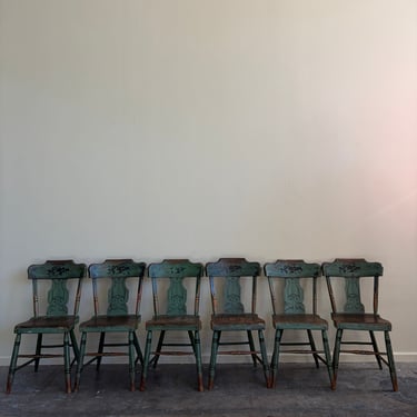 Pennsylvania Sheraton Paint-Decorated Plank Seat Chairs. Sold in pairs.