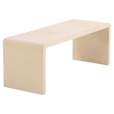 A Minimalist Parchment Waterfall Coffee Table.