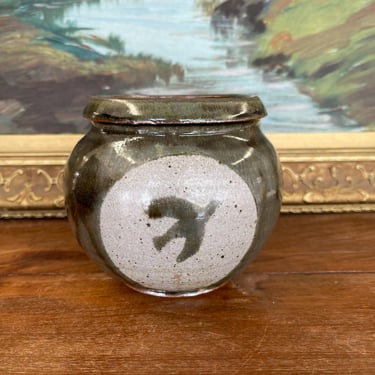 Free shipping within continental US - Vintage Studio Pottery Jar with Glazed Bird Silhouette and Earthy Green Finish 