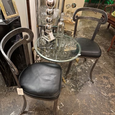 Heavy vintage pair of iron chairs with leather seats Italian