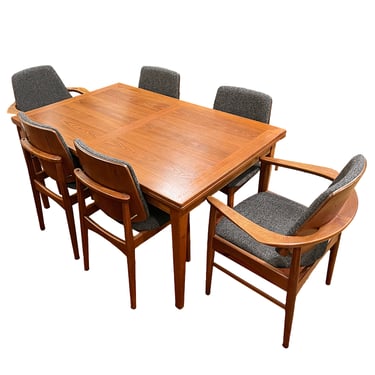Cross-Grain Dining Table — A Mid-Size Danish Modern Teak Expanding Rectangle