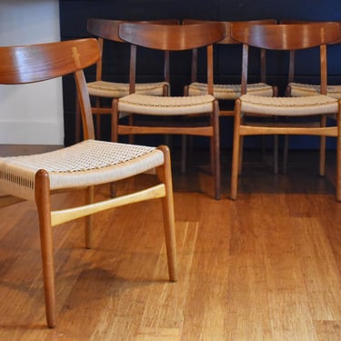 Six restored Danish teak and golden oak Hans Wegner CH-23 dining chairs, circa 1960s 