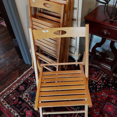 Wood folding chairs.