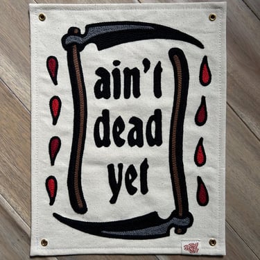 Off-white canvas chainstitched wall banner - Ain&rsquo;t Dead Yet with sickles & blood drops- traditional tattoos - chainstitch embroidery - decor 
