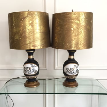 Mid century porcelain black and gold lamps, a pair | Greek key design | Roman gladiator chariot | gold marbled shades | paper shades 