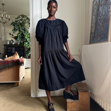 early 1980s Kenzo dress, black cotton with dark blue piping, round neckline, puffy sleeves, drop waist 