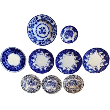 Lot 404 | (9) English Davenport and Johnson Bros. Pottery Flow Blue and White Plates