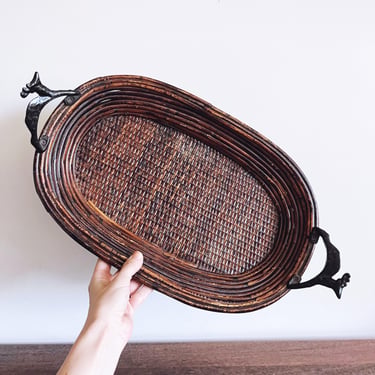 vintage Chinese rattan tray with cast iron reindeer handles 