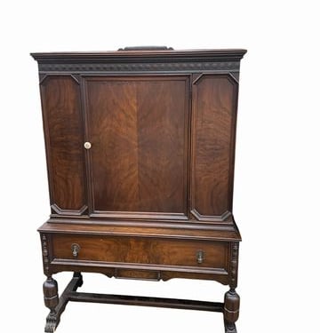 Antique Jacobean Revival-style china cabinet, 65H. 42.5W. 18D