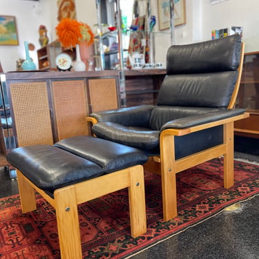 Danish Black Leather Lounge Chair with Ottoman by Nielaus Mobler