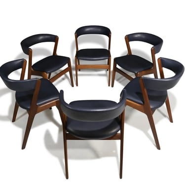 Six Mid-century Curved Back Dining Chairs in Navy Leather