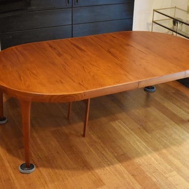 Restored Danish teak round-to-oval expandable dining table by Kofod Larsen - 87