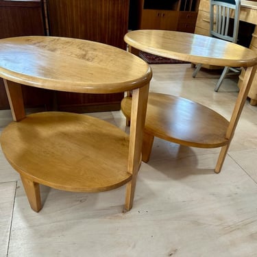 Pair of Art Deco design oval tiered side tables