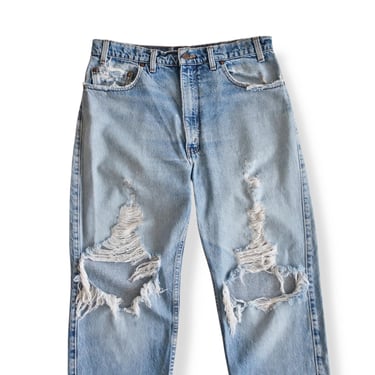 vintage Levis jeans / ripped knee pants / 1990s thrashed Levis relaxed fit grunge jeans 34 