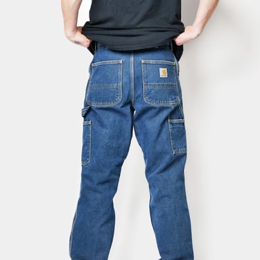 Carhartt vintage men's relaxed jeans | Dark blue washed workwear jeans | Hip Hop loose baggy straight fit single knee pants | 29 x 34 Small 