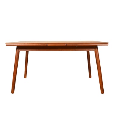 Splayed Leg Early + Rare Danish Teak Expanding Dining Table by Ejvind Johansson for FDB