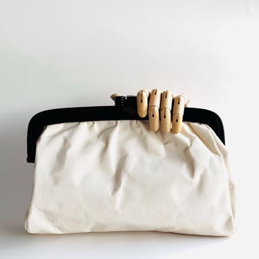 vintage Large kisslock frame clutch made in Italy in Ecru grosgrain fabric with black acrylic and metal frame 