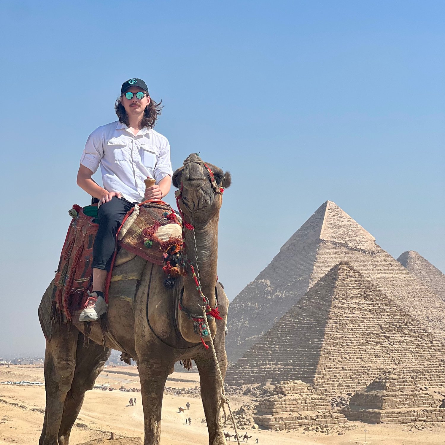Photo of Chandler on a camel in Egypt