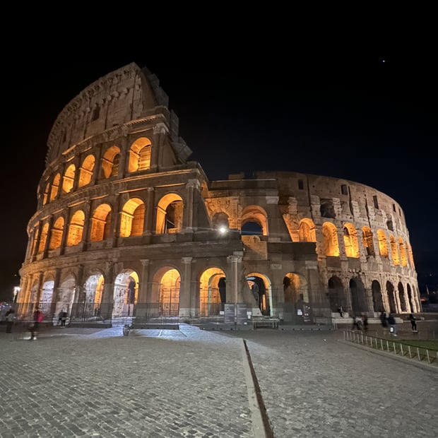 Photo of Colosseum by night