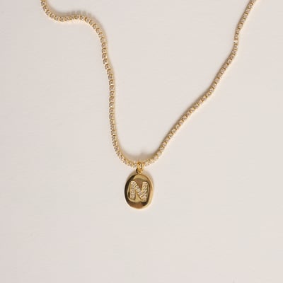 Colar Riviera pingente medalha letra N cravejada 12mm 40cm com alongadora