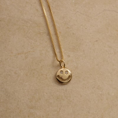 Colar pingente smile 10mm com zircônias 45cm com alongadora