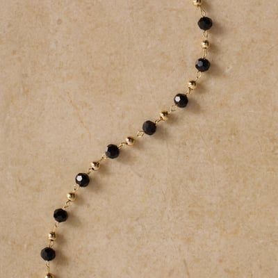 Pulseira entremeios cristais ônix e bolas 15cm com alongadora