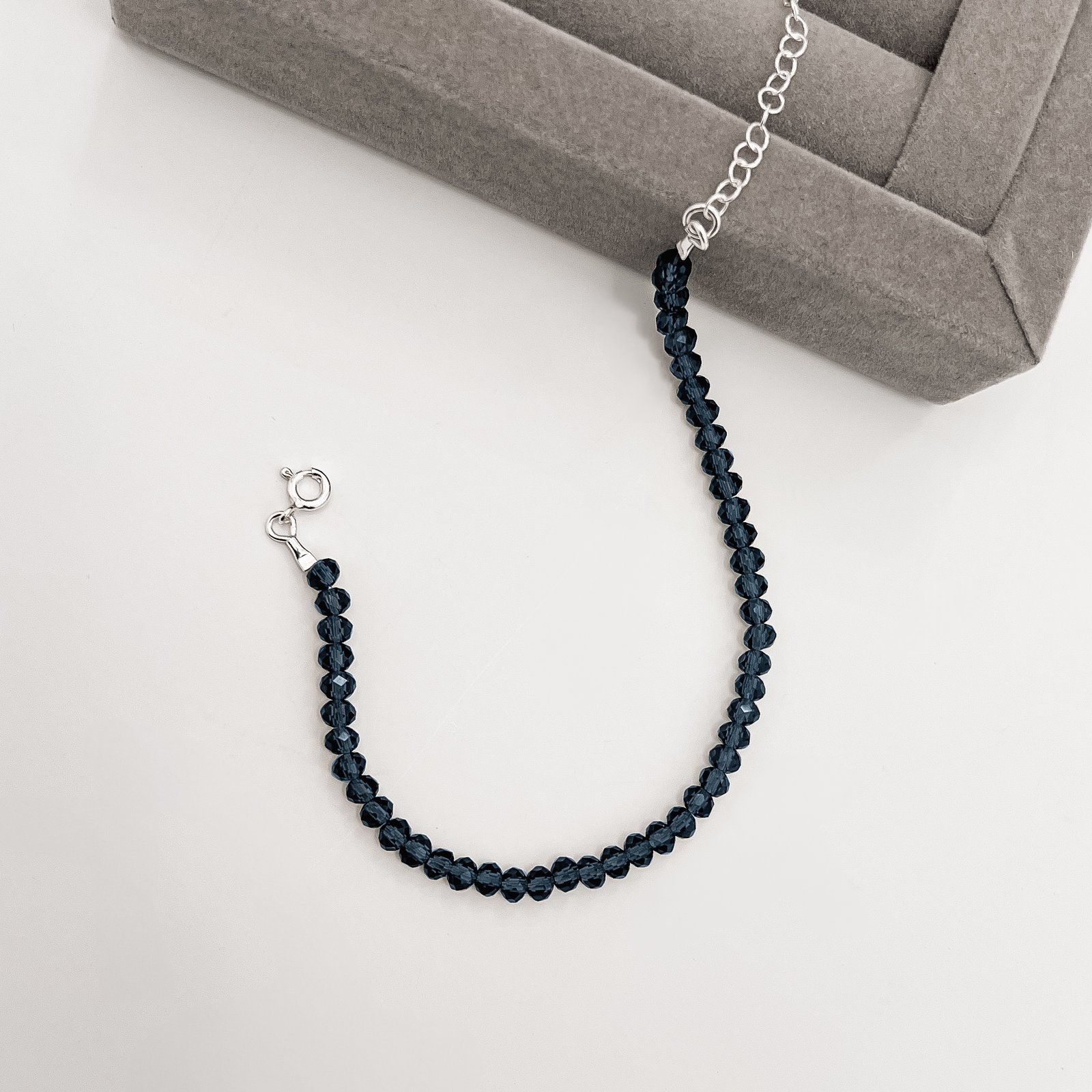 Pulseira cristal azul escuro transparente 4mm 16cm com alongadora