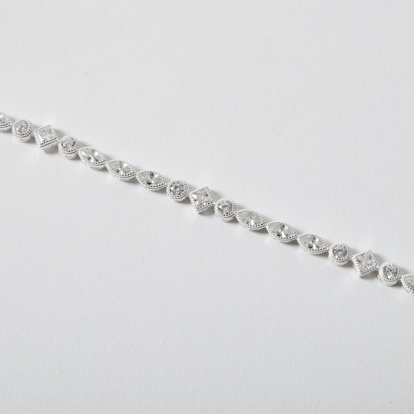 Pulseira entremeios zircônias redonda, losango e navete 6mm 16+5cm