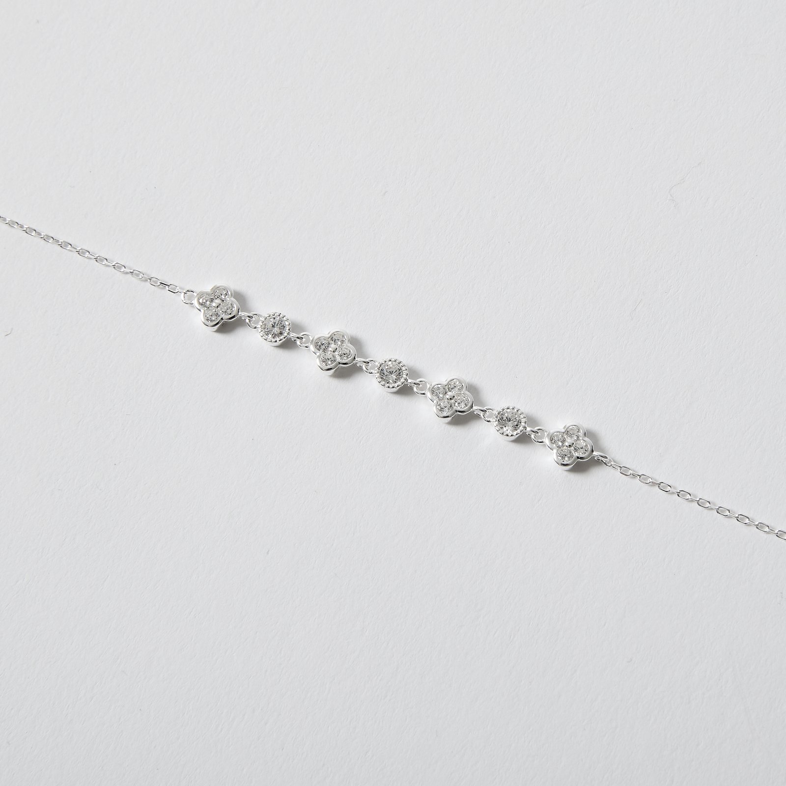 Pulseira entremeio trevos com zircônias 6mm 16+5cm